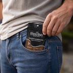 Person holding a Beankick coffee package in their jeans pocket.