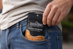 Person holding a package of BeanKick Pocket Coffee in their jeans pocket.